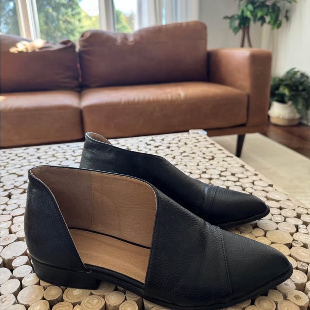 Black pointed toe booties